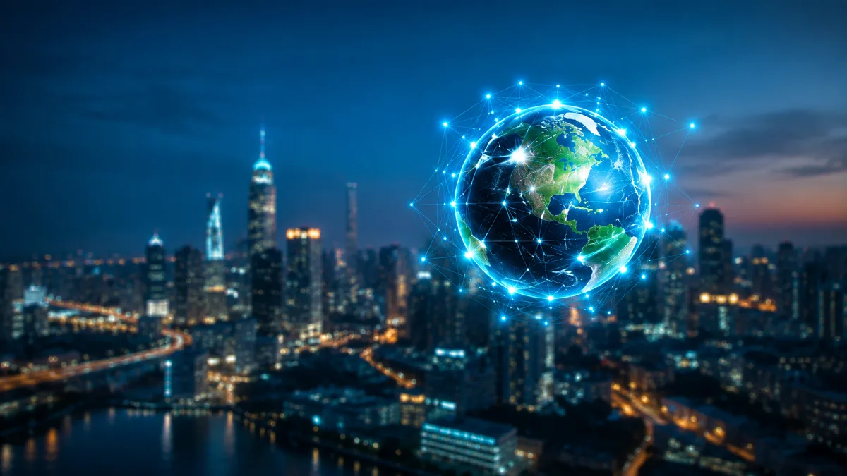 A glowing digital globe floats above a city skyline, representing smart grids and connected energy.